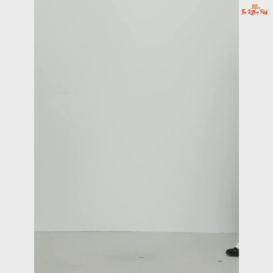 2026 Women's V-neck Striped Fake Two-Piece Wool Sweater with layered look, striped knit pattern, and casual autumn/winter style.