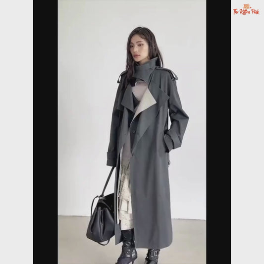 Women’s Gray Color-Block Trench Coat 2026 with slim fit, pockets, turn-down collar, and long windbreaker design in light gray style.